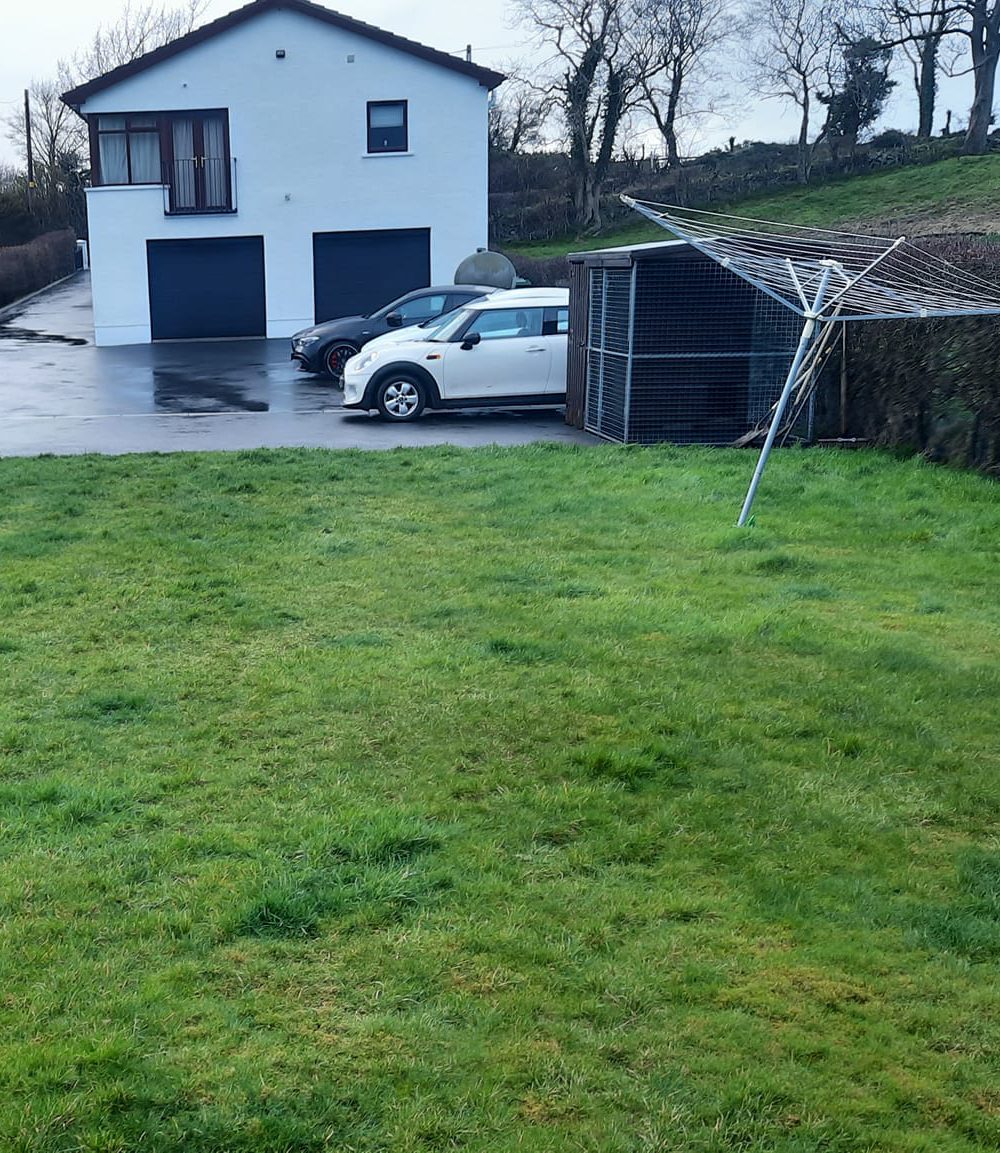 Grass garden before installation of a new patio