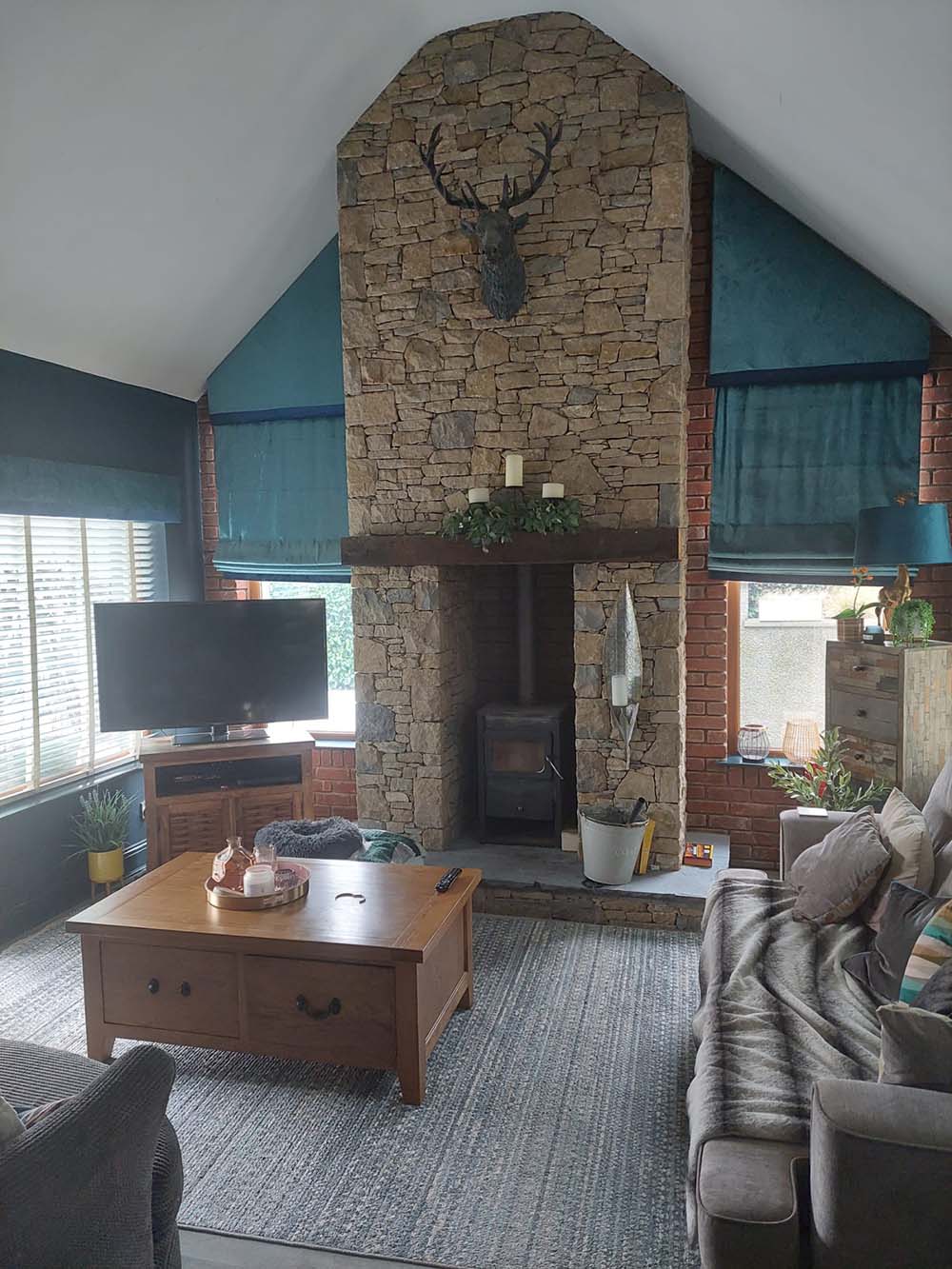 interior of a newly built extension with stone chimney breast